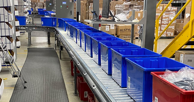 blue totes on conveyor